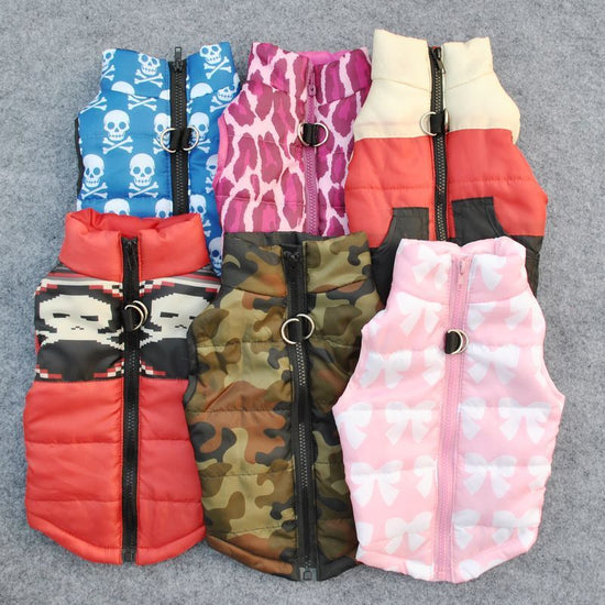 Winter pet padded jacket vest with a traction buckle, providing warmth and secure support for cold weather walks